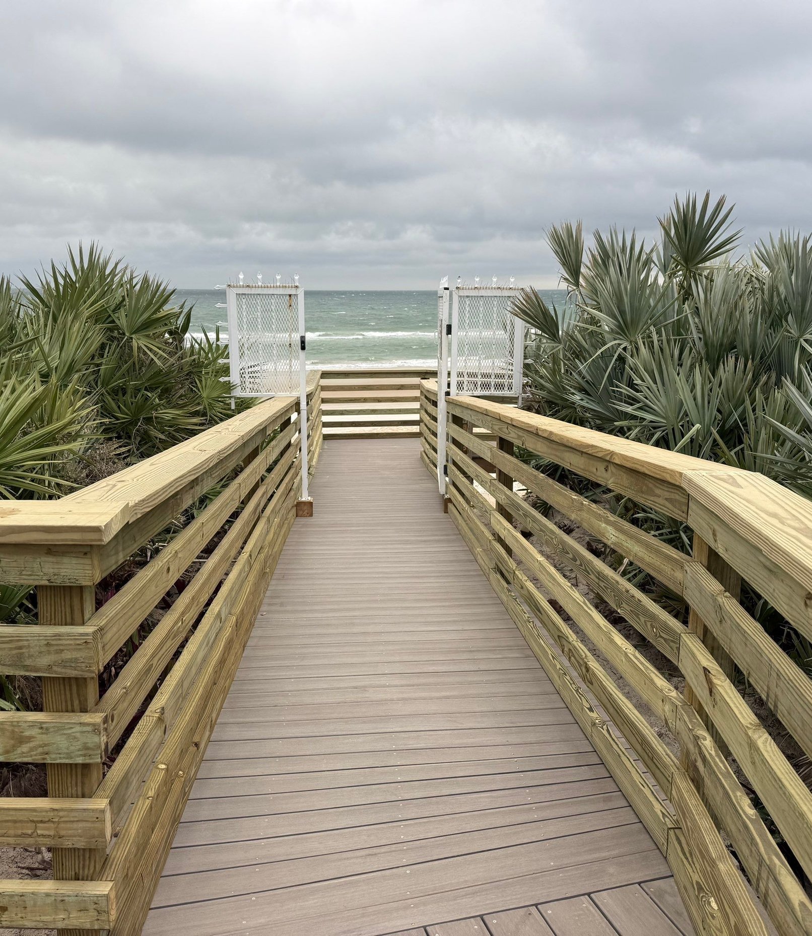 Custom dock and seawall along coastal property in Florida