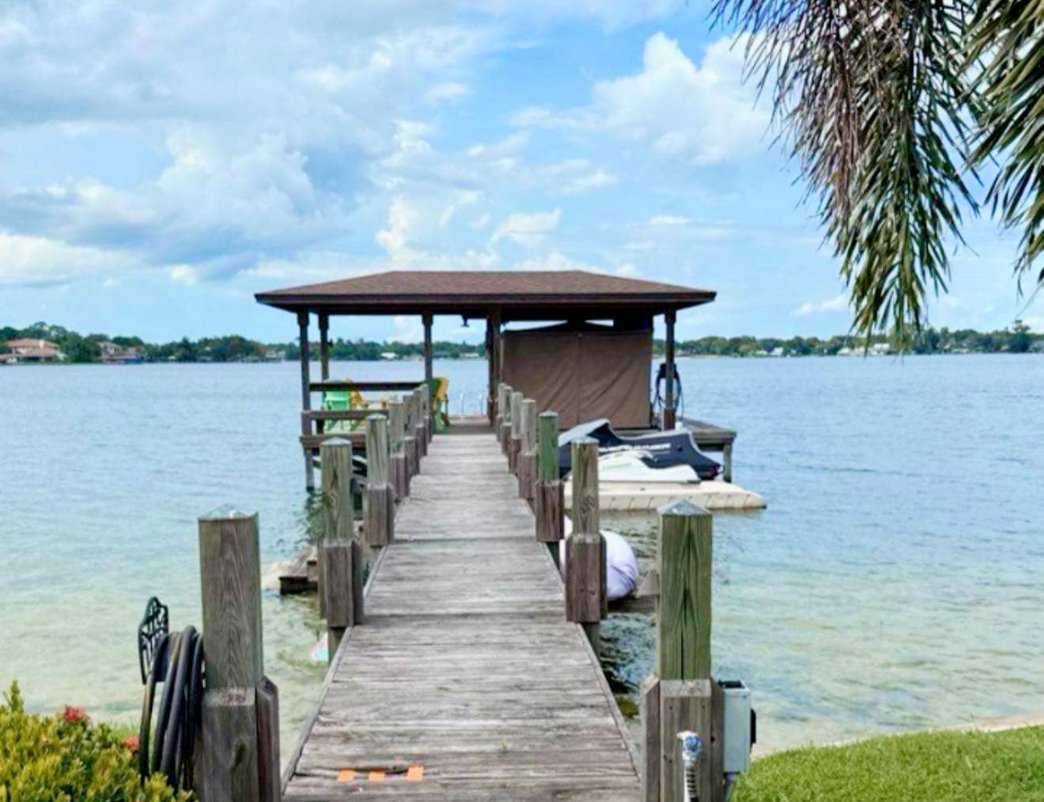 Boat dock with landscaped waterfront area