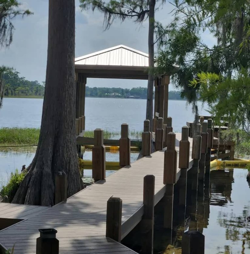 Elevated dock walkway with railing