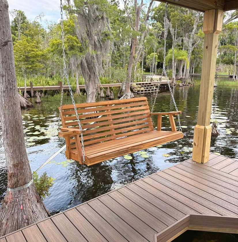 Outdoor deck and dock area overlooking water